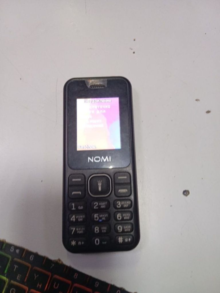 Дешево Nomi i1880 Black з ломбарду