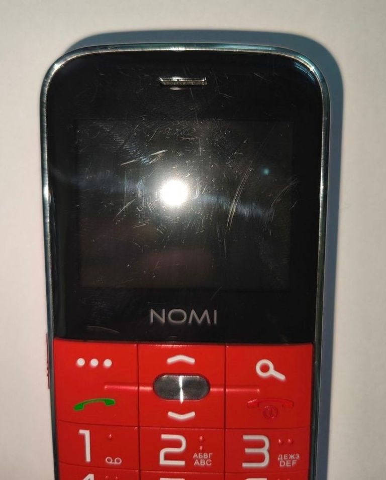 Дешево Nomi i220 Red з ломбарду