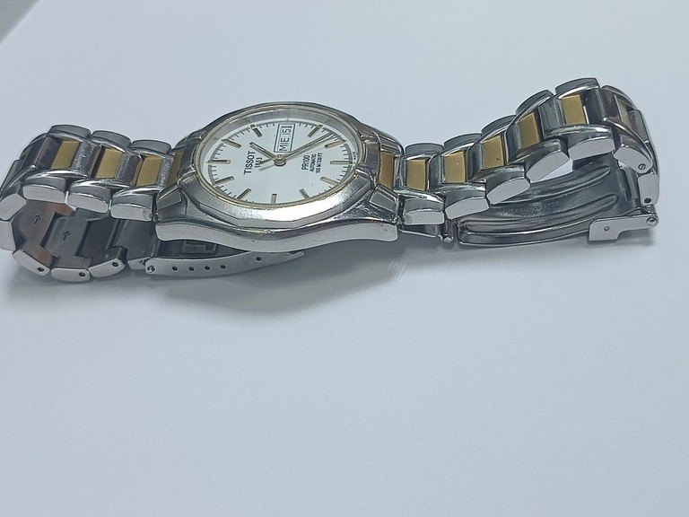 Дешево Tissot pr100 p764 з ломбарду