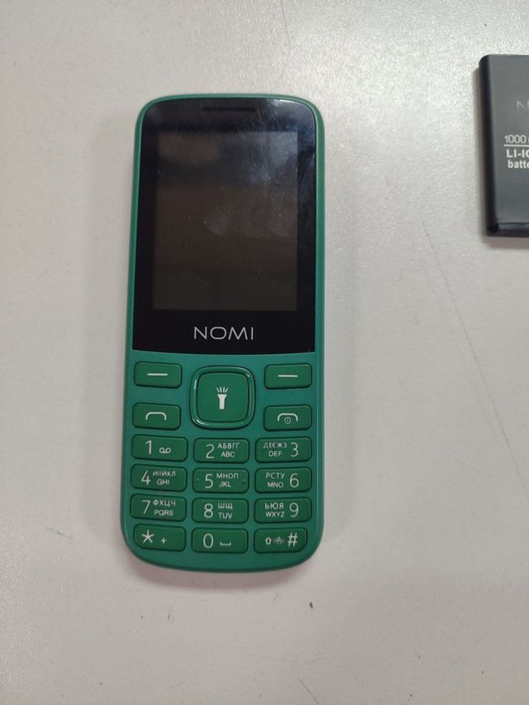 Купити Nomi i2403 Б/У