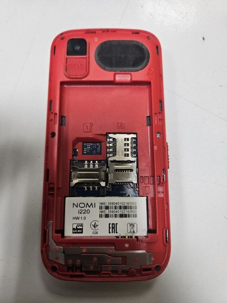 Дешево Nomi i220 Red з ломбарду