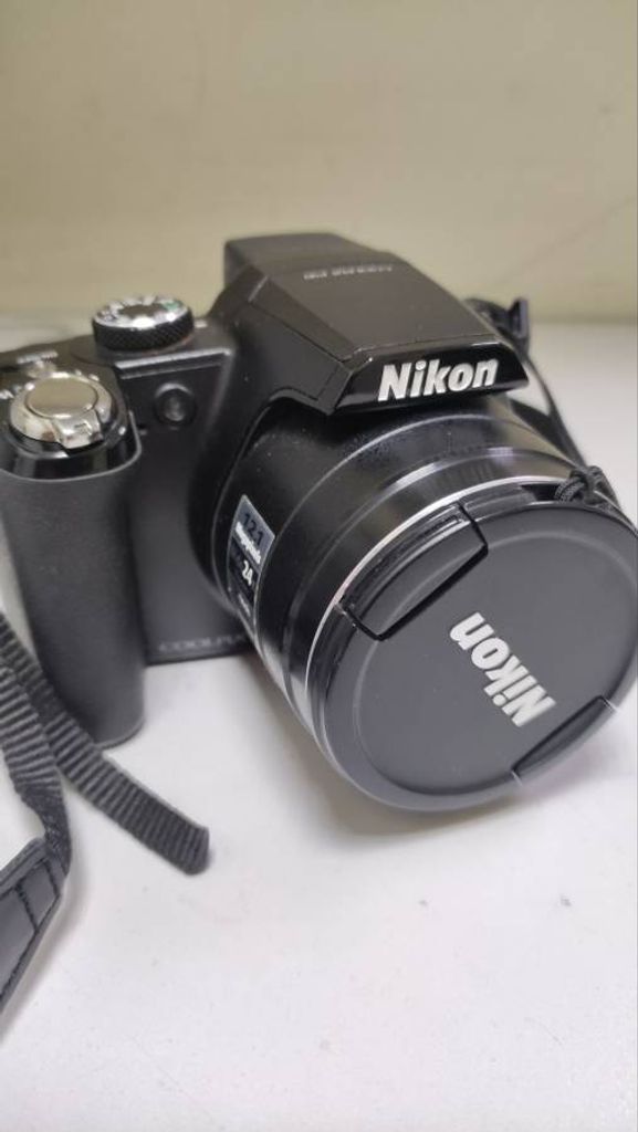 Nikon coolpix p90 zoom 24x ed vr 12.1mp f/2.8-5.0