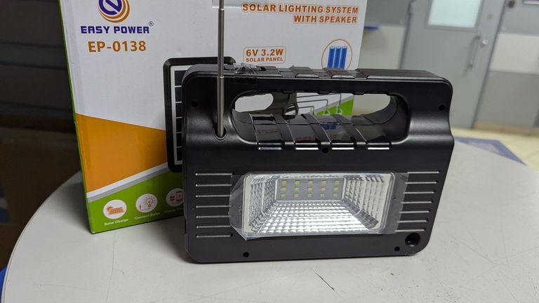 Купити Без Виробника із power bank easy power ep-0138b із сонячною батареєю та 3 лампочками чорни Б/У