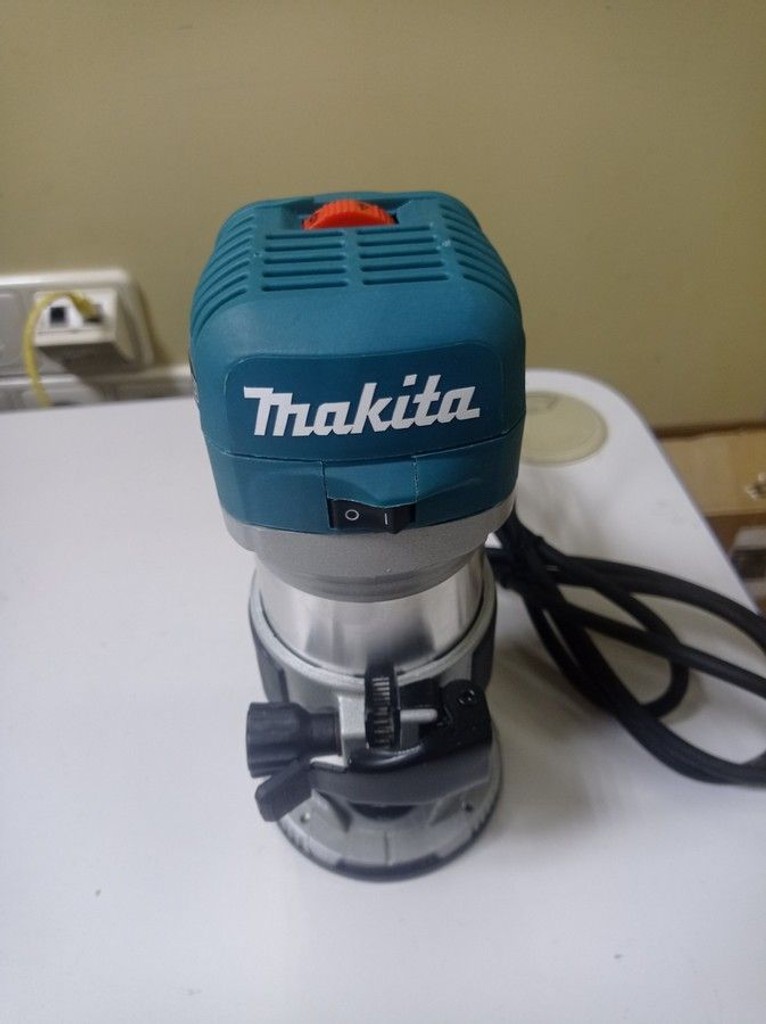 Дешево Makita Підробка rt0700c з ломбарду