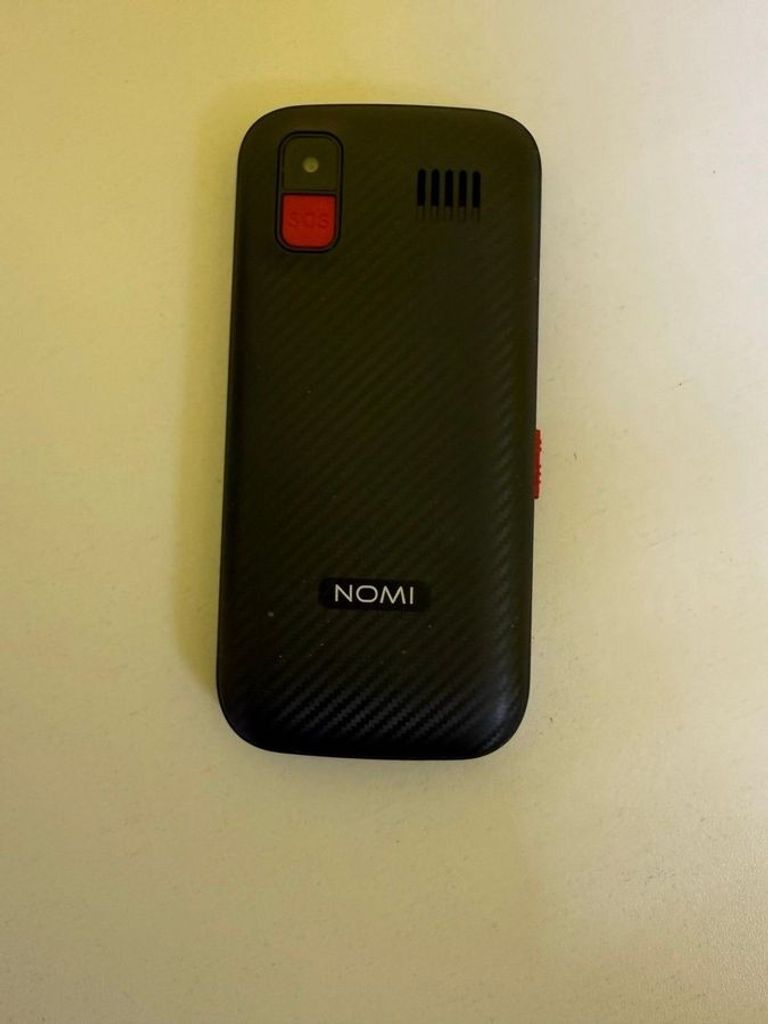 Дешево Nomi i220 Red з ломбарду