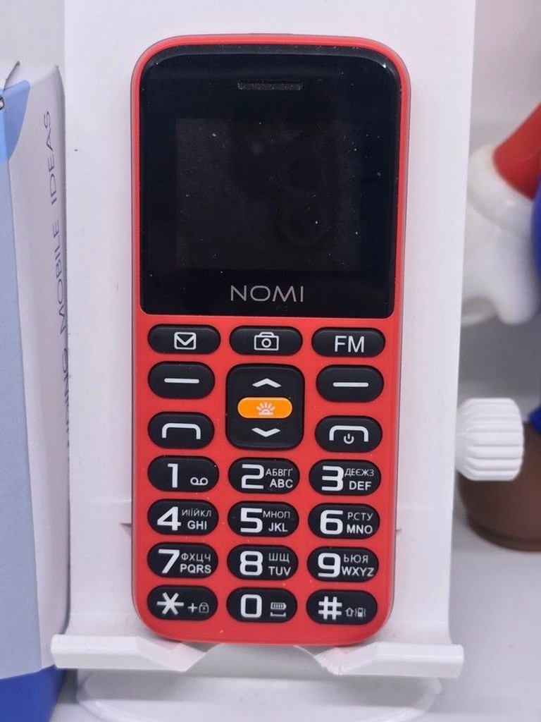 Дешево Nomi i1820 Red з ломбарду