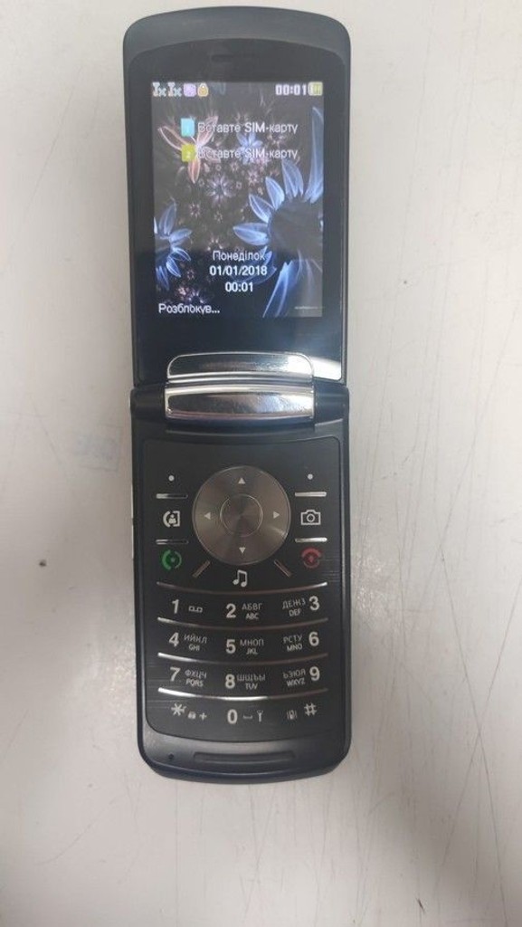 Купить Nomi i2830 Black Б/У