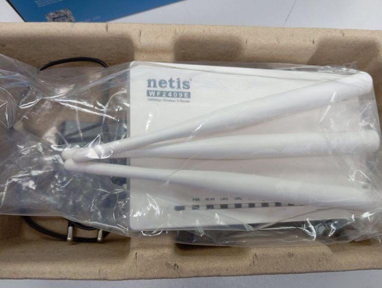 Дешиво Netis systems WF2409E с ломбарда