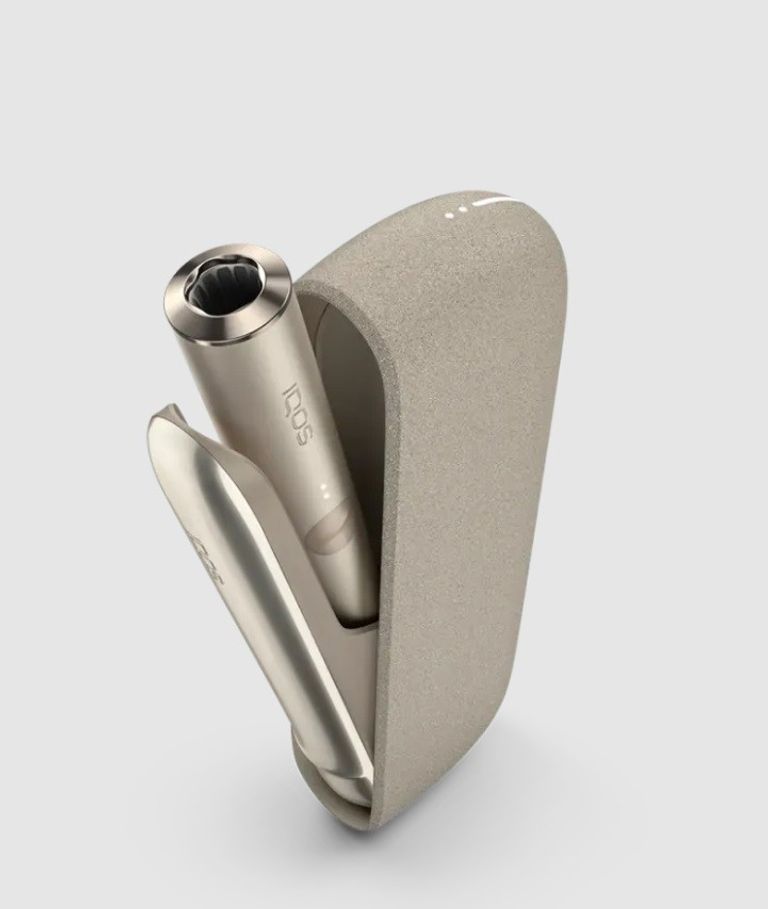 Купить Новий пристрій iqos iluma . Золотий. Запакованний. Гарантія. Б/У