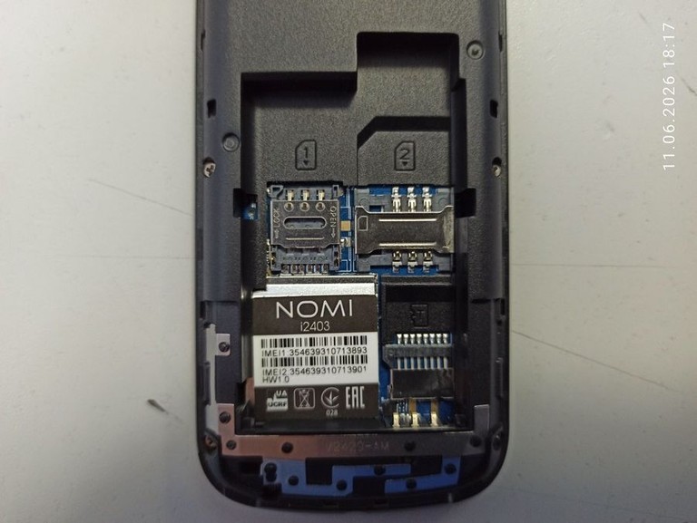 Купить Nomi i2403 Б/У