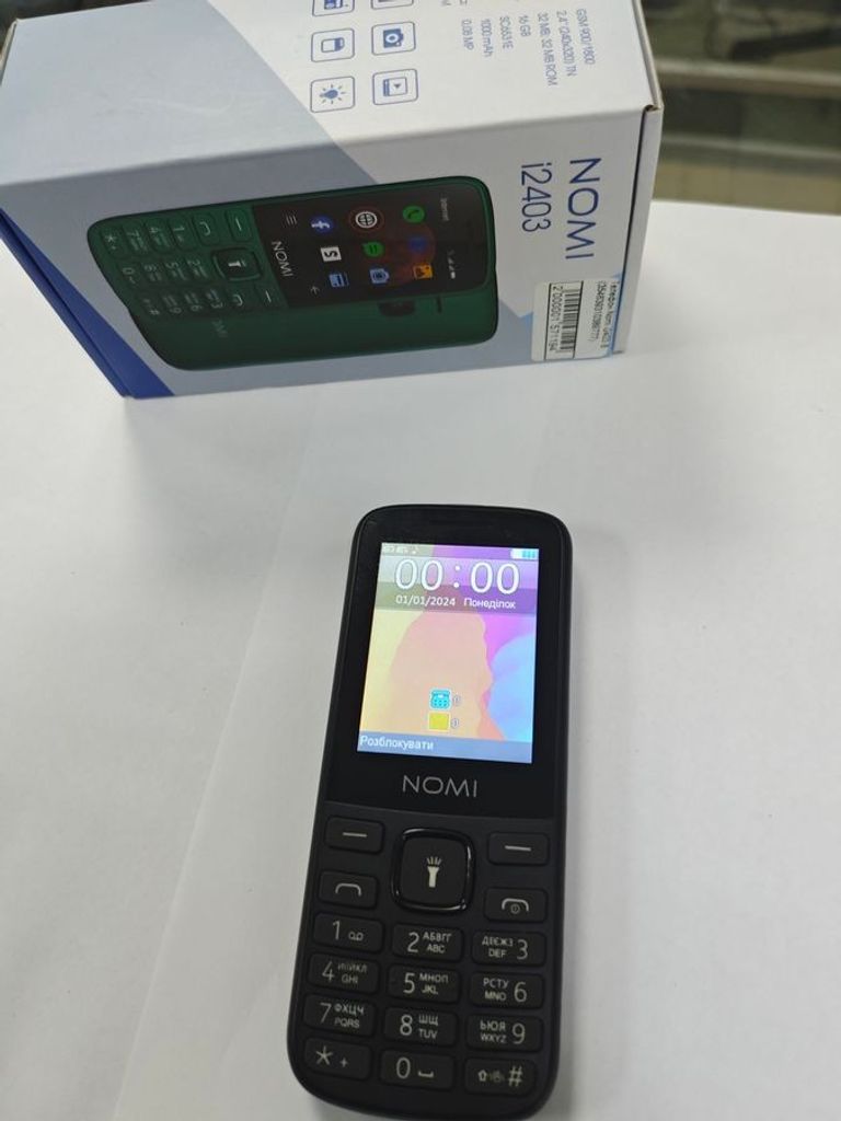 Дешево Nomi i2403 з ломбарду