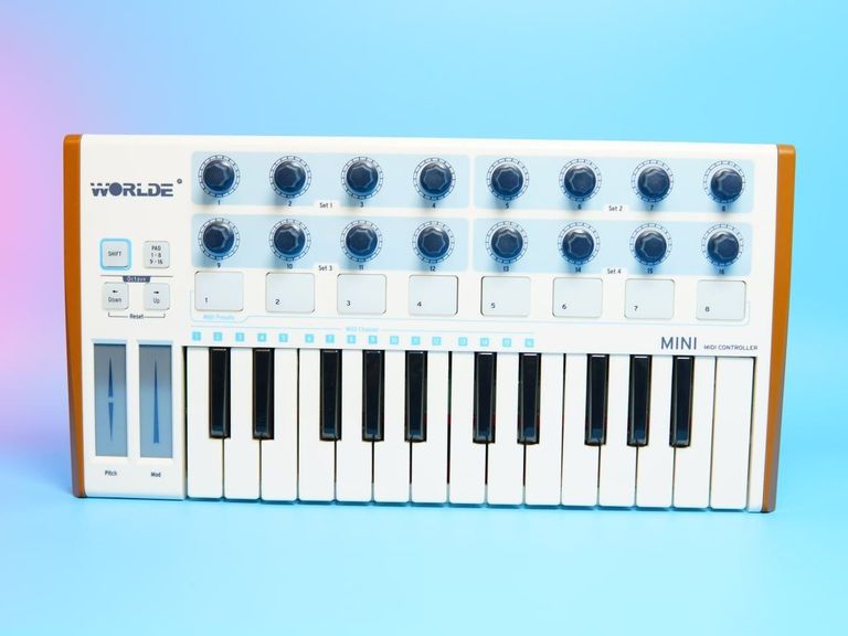 Дешево 25 клавіш + Drum Pad з ломбарду