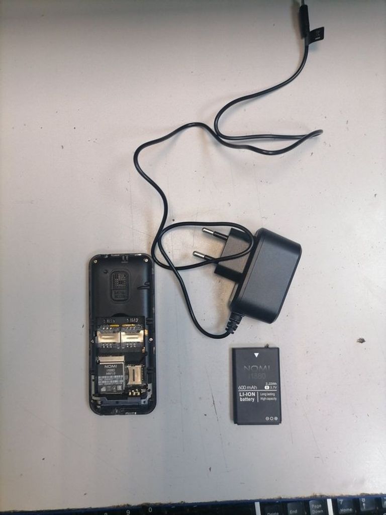 Купить Nomi i1880 Black Б/У