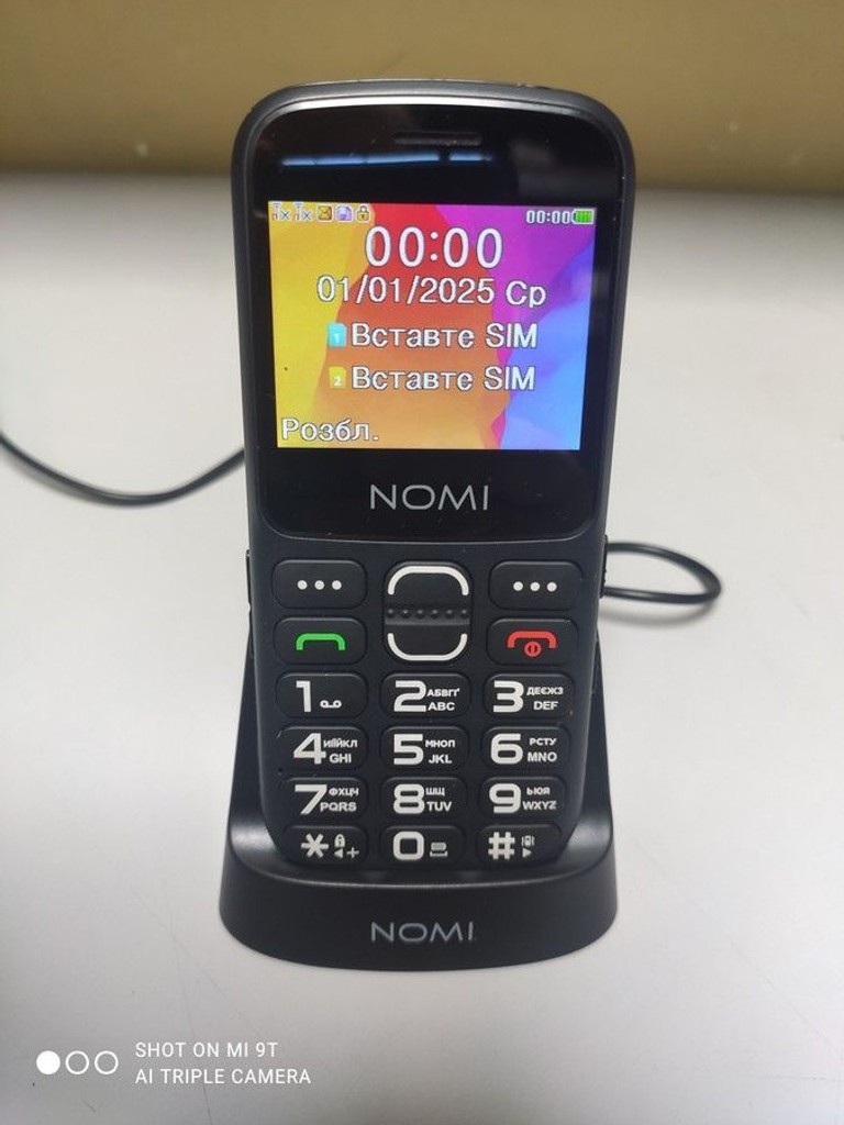 Купити Nomi i2320 Black Б/У
