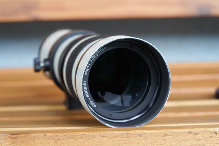 Дешиво Супертелеоб'єктив Andoer 420-800 мм F/8.3-16 HD з ручним зумом та T-подібним кріпленням для цифрових дзеркальних камер Canon, Ni с ломбарда