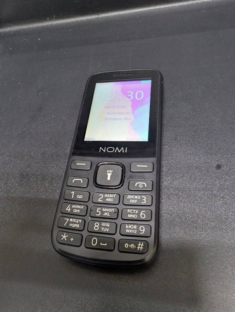 Купить Nomi i2403 Б/У