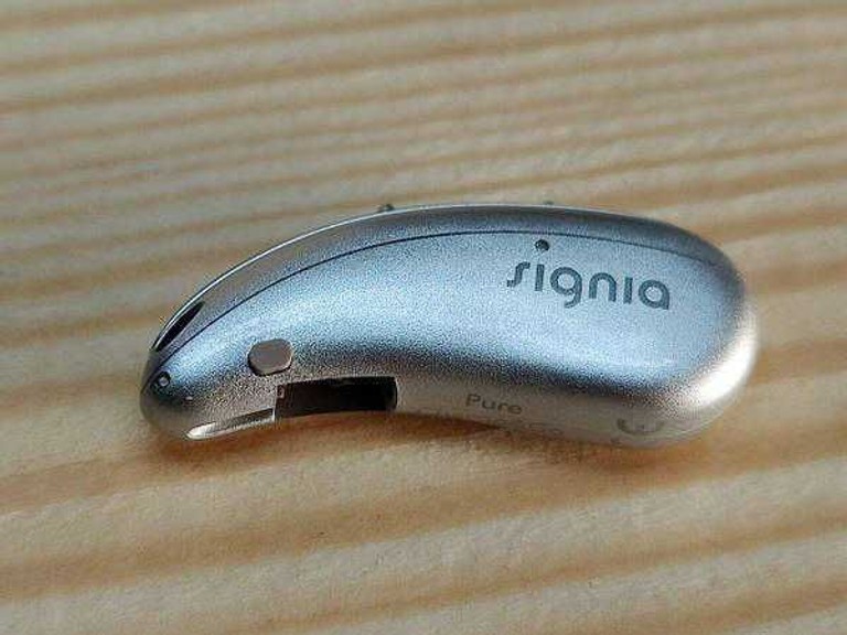 Купить 7X Signia Pure  Б/У