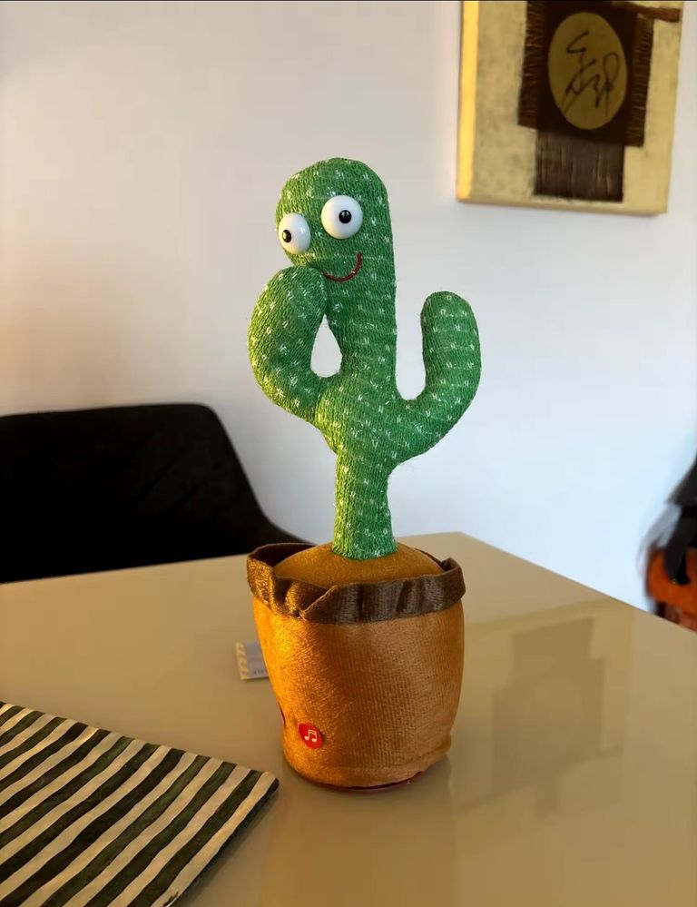 Купити Дитяча музикальна іграшка танцюючий кактус Б/У