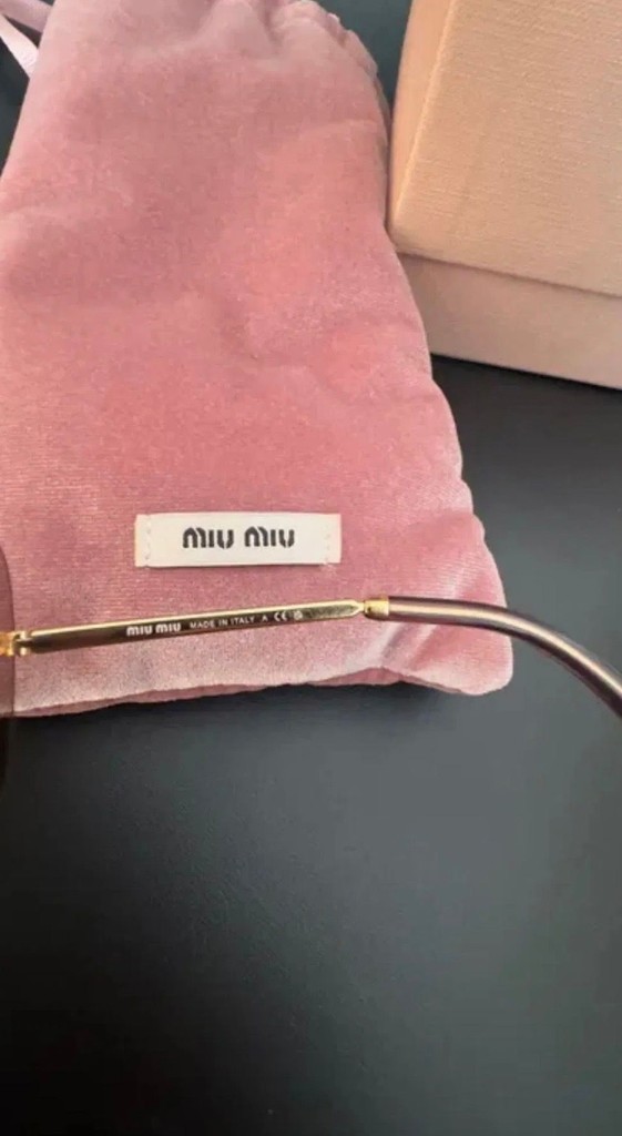 Дешево Miu Miu з ломбарду