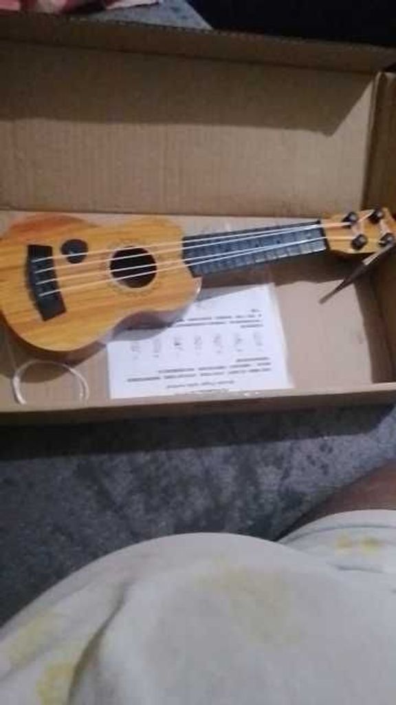 Оголошення Іграшкова гітара із медіатором Б/У