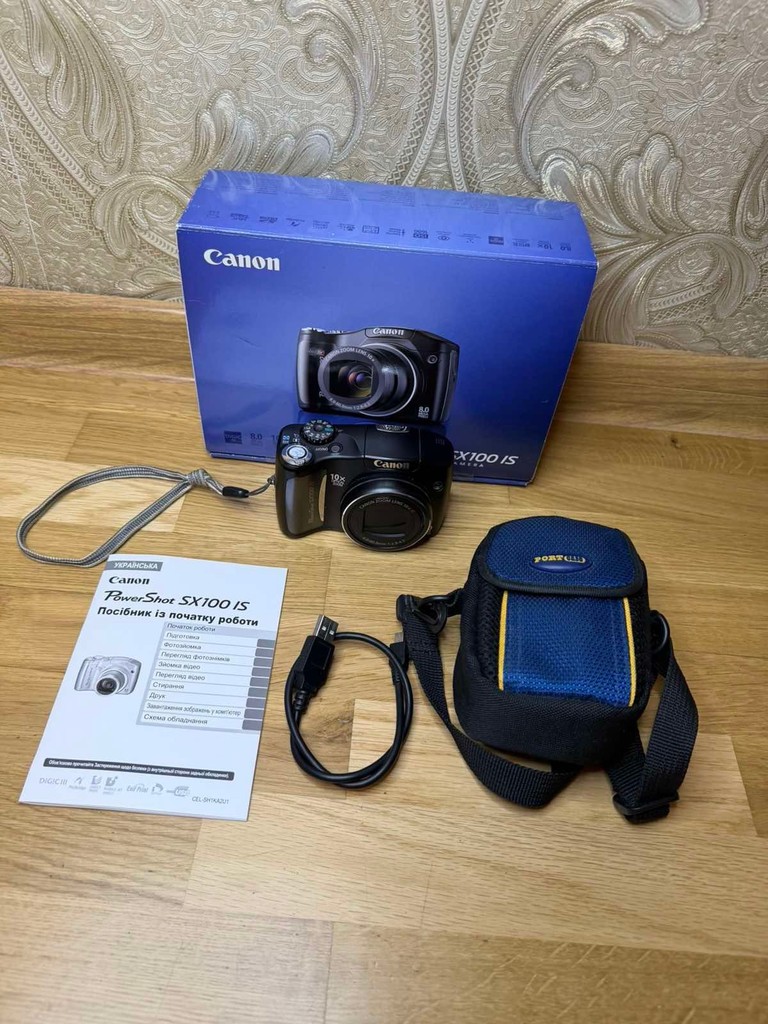 Купити Цифровий фотоапарат Canon PowerShot SX100 IS Black Б/У