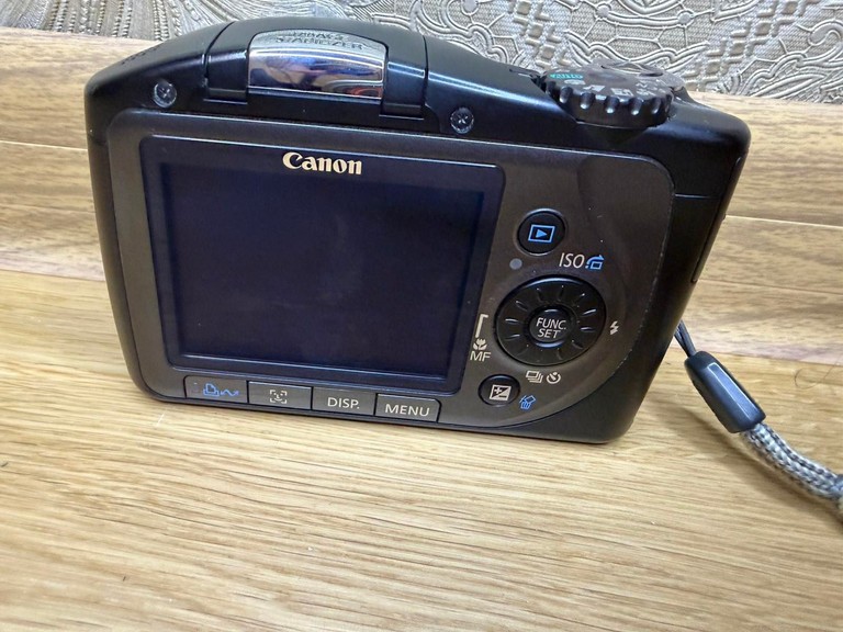 Дешево Цифровий фотоапарат Canon PowerShot SX100 IS Black з ломбарду