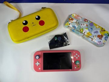 01-200579501: Nintendo switch lite animal crossing: new horizons timmy & tommy aloha edition