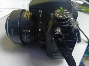 Б/в Фотоапарат Nikon d7000 af-s dx nikkor 35mm f/1,8g 01-200974479
