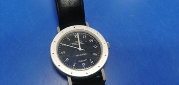 01-200417760: Angular Momentum revolving-disk-system swiss made quartz