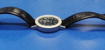 01-200417760: Angular Momentum revolving-disk-system swiss made quartz