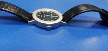 01-200417760: Angular Momentum revolving-disk-system swiss made quartz