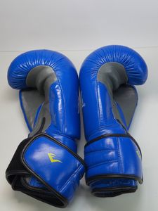 Б/у Боксерские перчатки Everlast 12 oz шкіра синьо-чорні 01-200867957