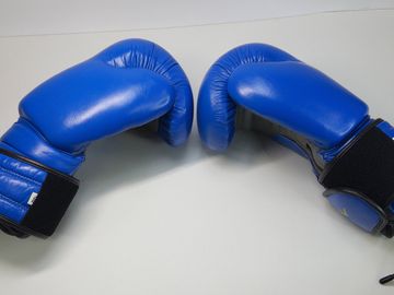 Б/у Боксерские перчатки Everlast 12 oz шкіра синьо-чорні 01-200867957