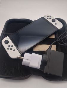 Б/у Игровая приставка Nintendo switch oled 01-200810477