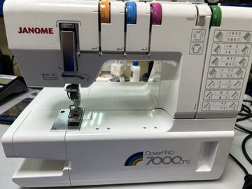 01-200600117: Janome cover pro 7000cps