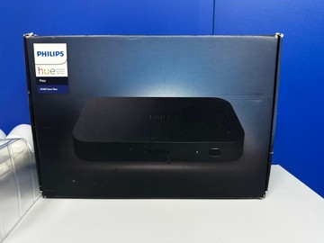 Б/в Комплект розумного освітлення Philips philips hue e27 + hdmi sync box 01-201064534
