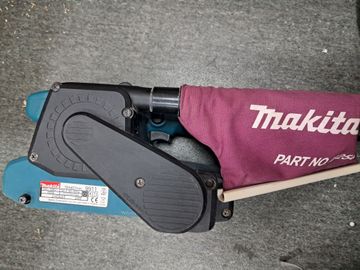 01-200547563: Makita 9911