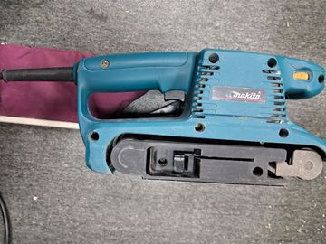 01-200547563: Makita 9911