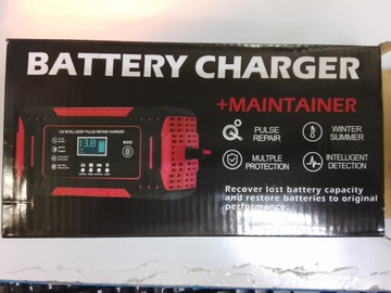 Б/в Автомобільний зарядний пристрій Battery Charger 104404 01-201112783