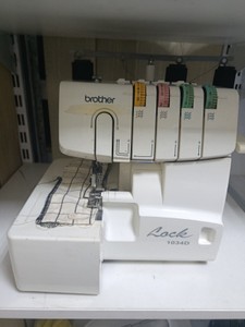 Б/в Швейна машина Brother lock 1034d 01-200940843