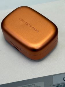 01-200611742: Bang & Olufsen beoplay eleven copper tone