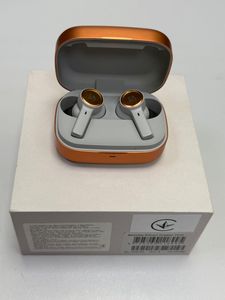 01-200611742: Bang & Olufsen beoplay eleven copper tone