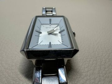 01-18846646: Nixon the paddington watch bent