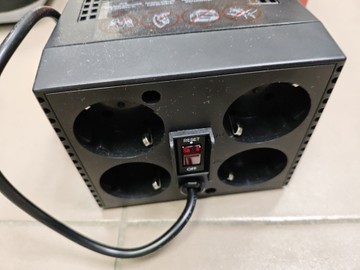 Б/в Стабілізатор напруги Powercom tca-600 1schuko 01-200928319