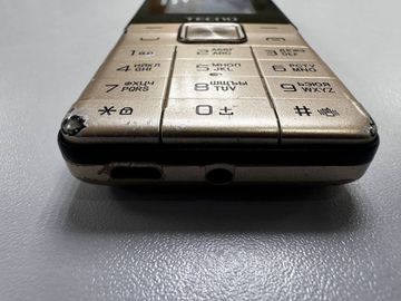 Б/в Мобільний телефон Tecno t301 01-200827906