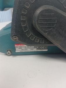 01-200595262: Makita 9911